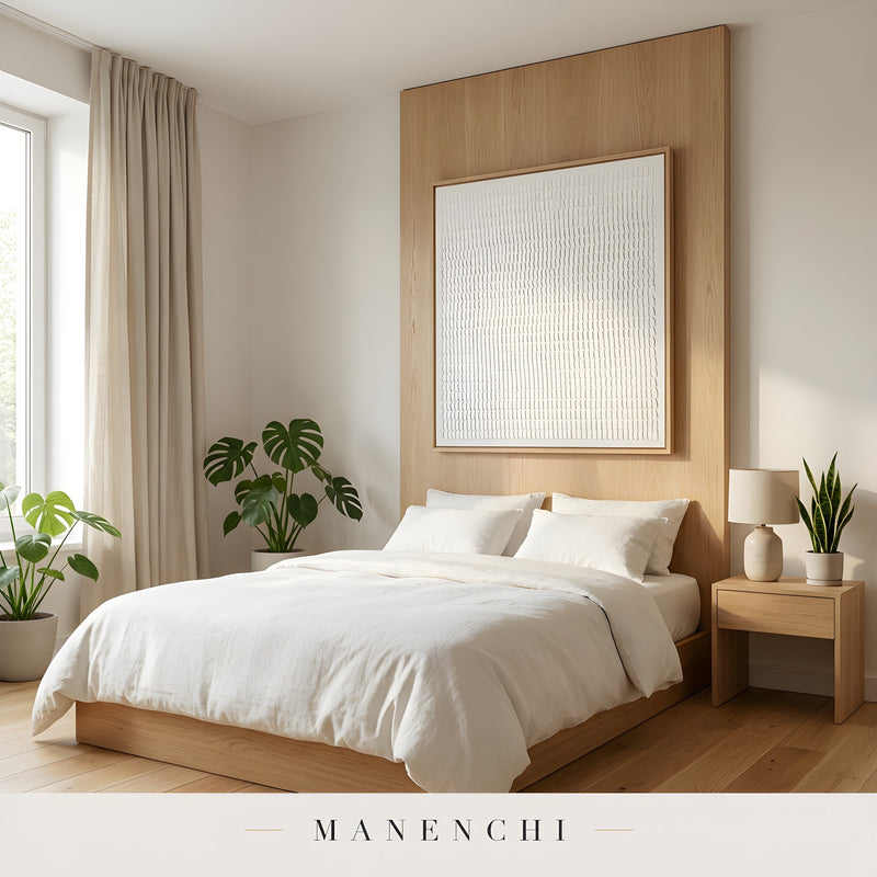 Minimalist Sculptural Monochrome abstract painting displayed in cozy bedroom interior