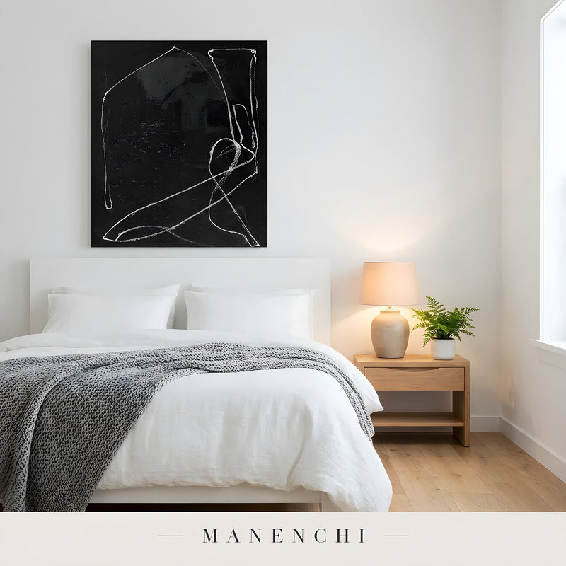 Monochromatic Essence abstract painting displayed in bedroom with nightstand lamp